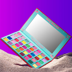 Blending and packing pigments from KimChiChic Holy Sharts Eyeshadow