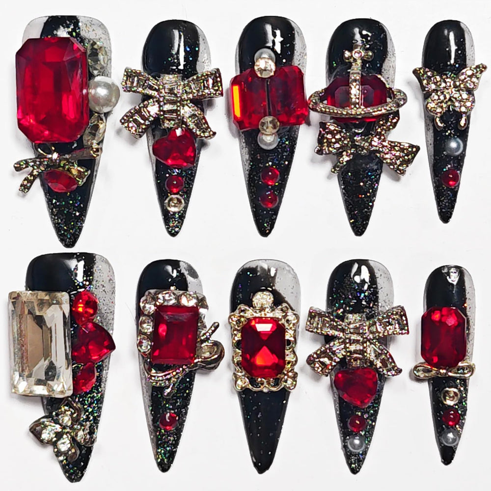 KimKista handmade stiletto nails in black for bold evening style.