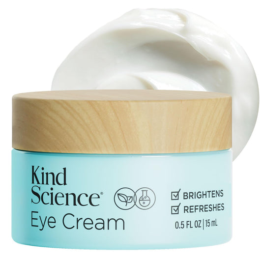 Kind Science Eye Cream bottle closeup highlighting fragrance-free hydration for under-eye skin.