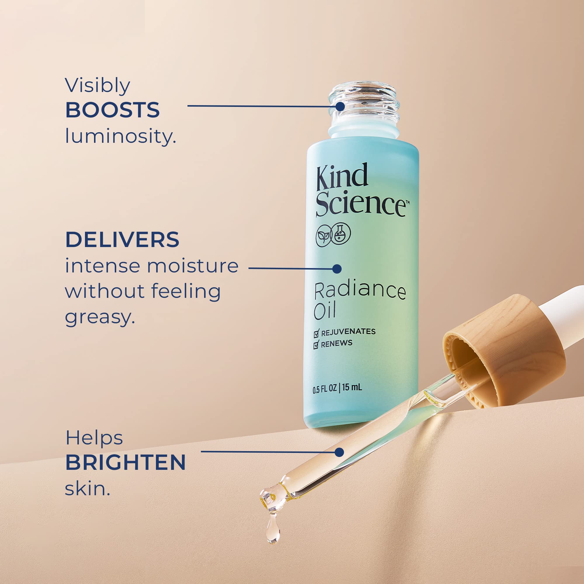 Kind Science Radiance Oil drop on skin shows dewy finish