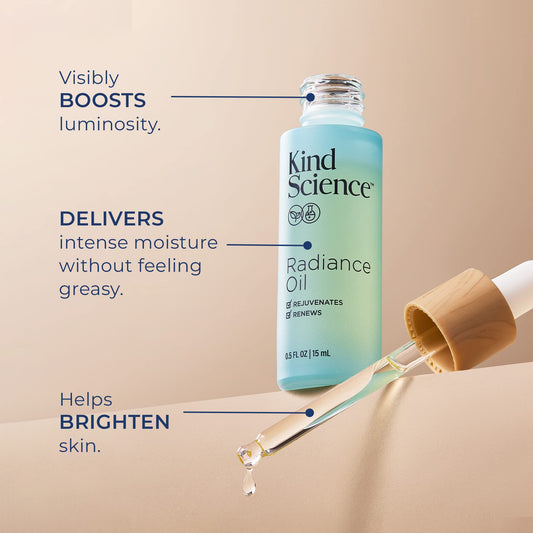 Kind Science Radiance Oil drop on skin shows dewy finish