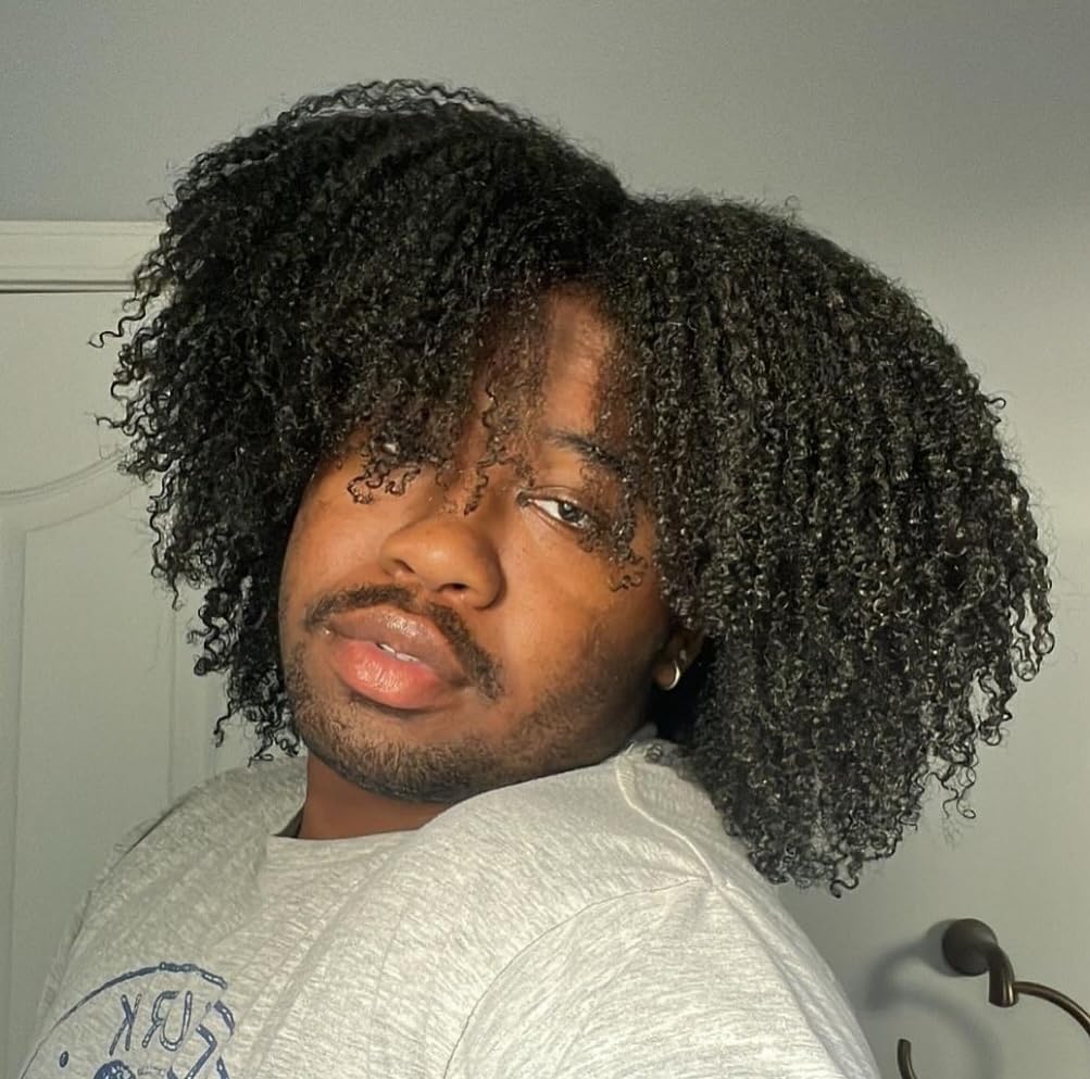 Kinky Curly Come Clean Shampoo bottle with setting scene showing refreshing hair care solution.