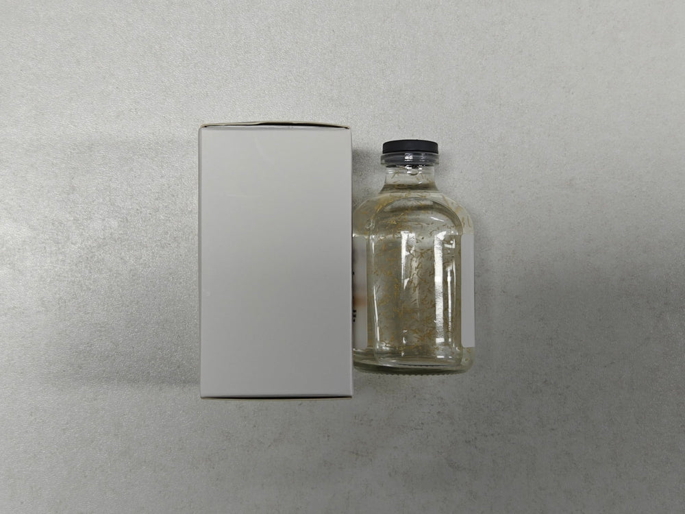 KKINYAS Non-greasy formula packaging with clear label.