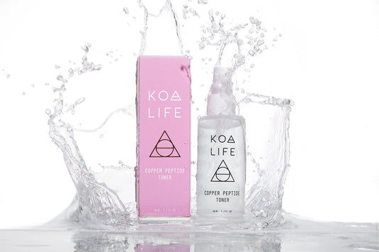 KOA LIFE Copper Peptide Toner bottle on counter for daily hydration and glow.