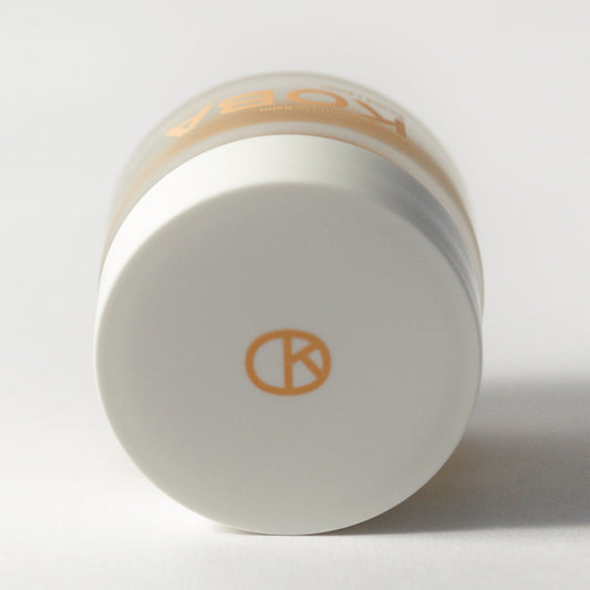 KOBA lip balm glides on smoothly for lasting moisture.