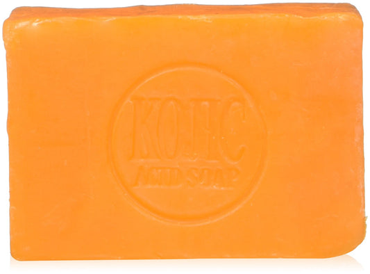 Kojie San Original Kojic Acid Soap bar showing exfoliating texture for a brighter, more even complexion.