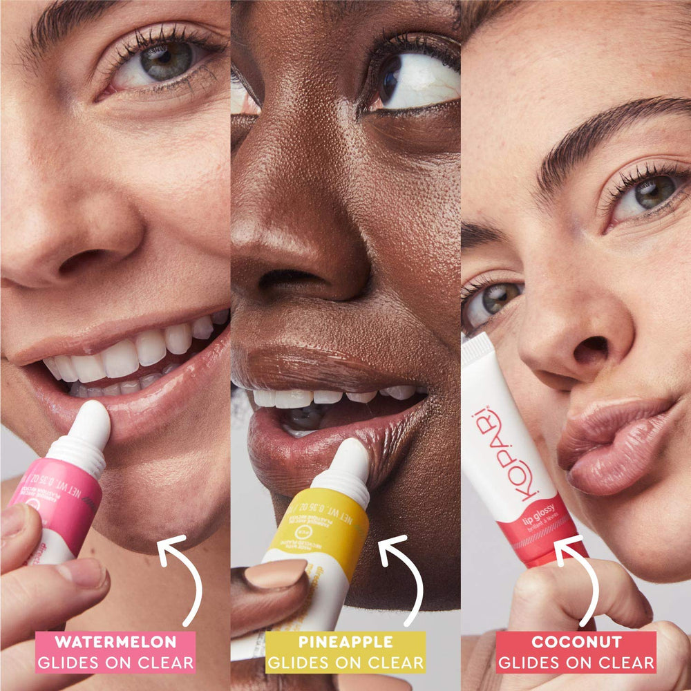 Kopari Coconut Lip Glossy on lips provides a glossy, kissable shine.