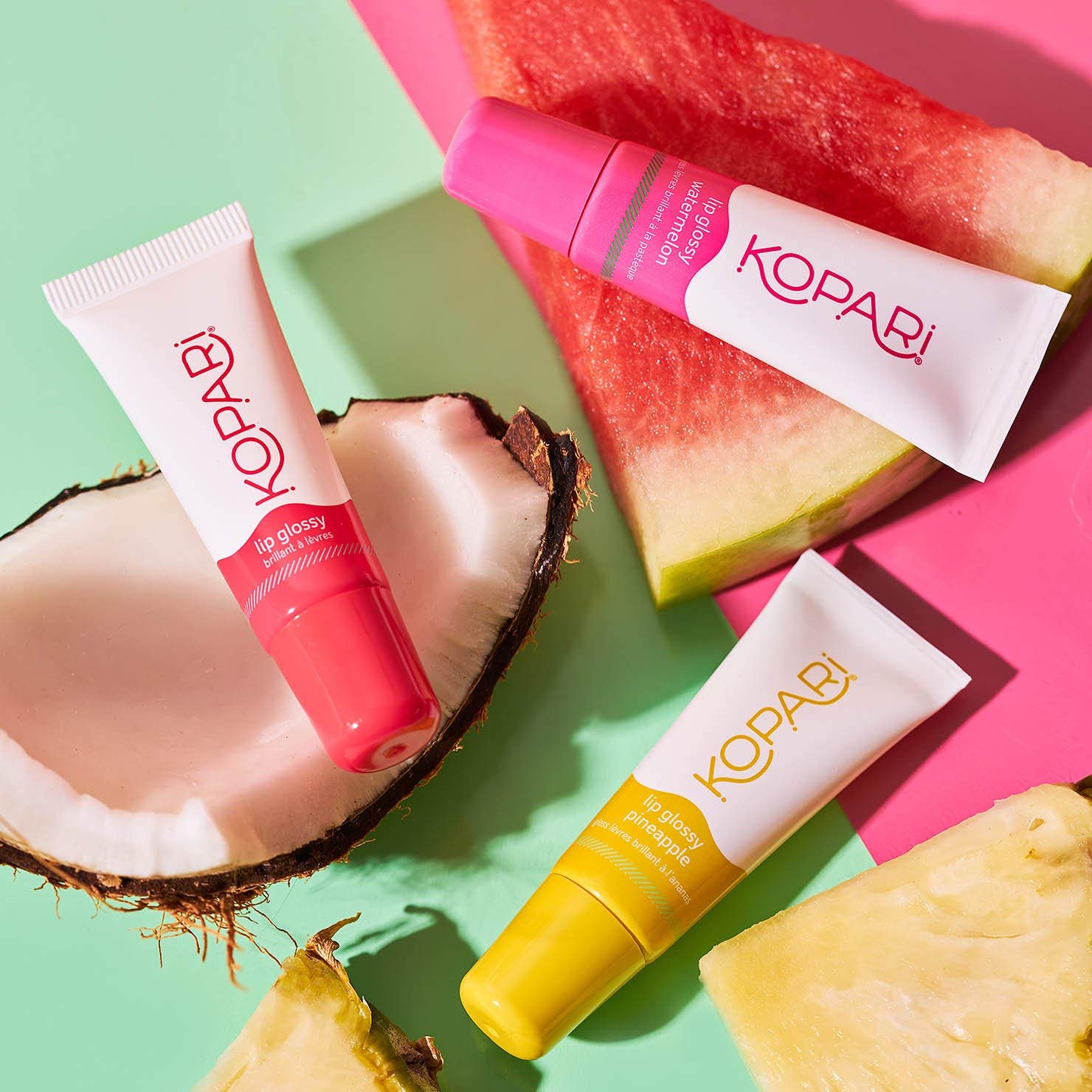 Kopari Lip Glossy coconut-vanilla flavor notes add tropical feel.