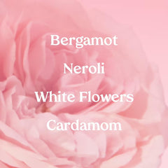 Kopari Marbella Bloom spray action illustrating easy day-to-night fragrance application