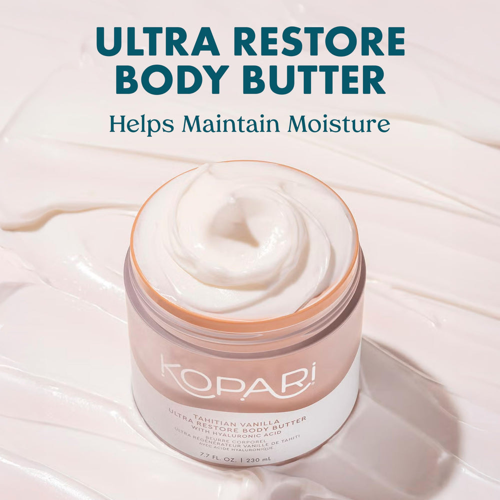 Kopari Ultra Restore Body Butter being scooped for quick absorption and nourishment.