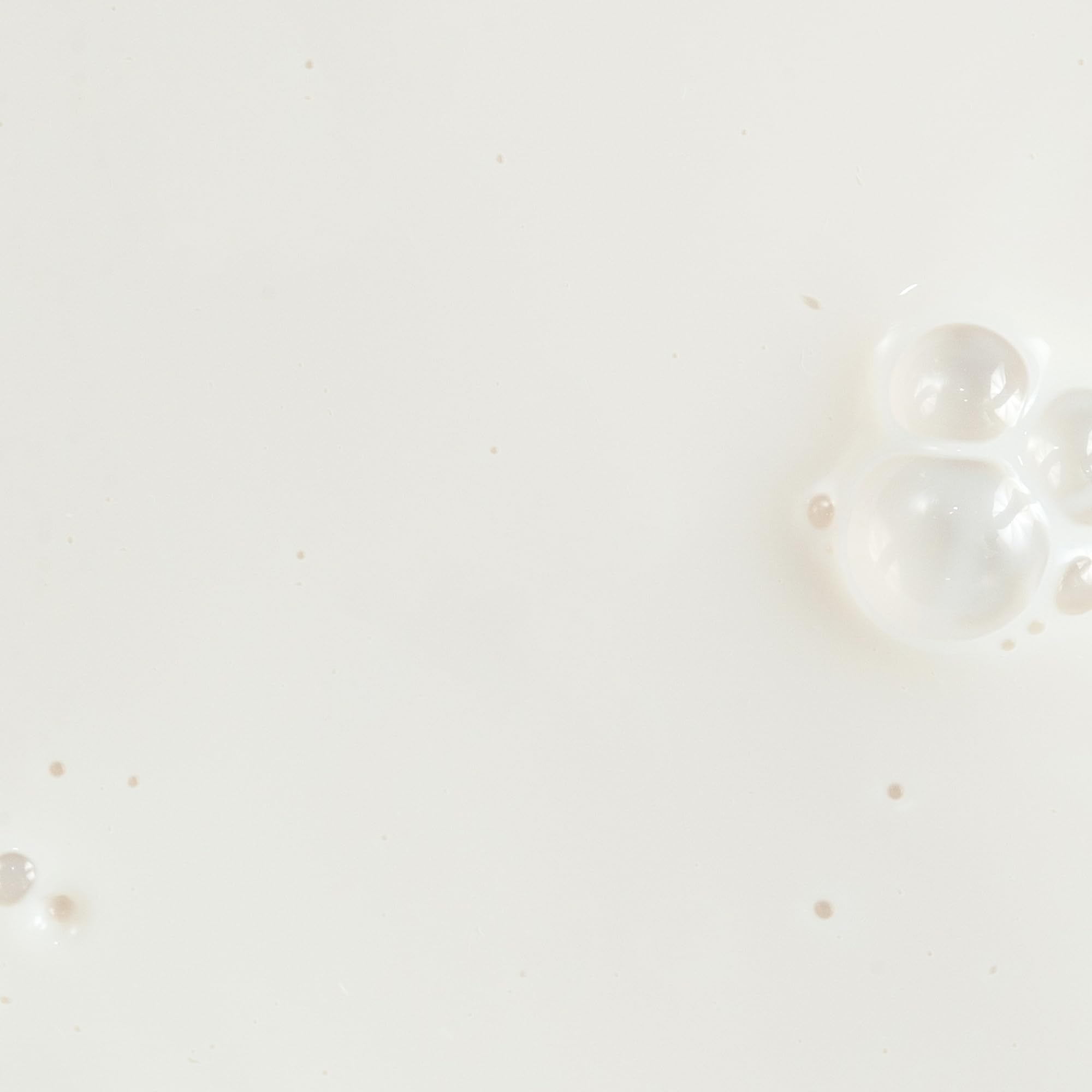 KORA Organics Silky Sun Drops spread on skin for a dewy finish.