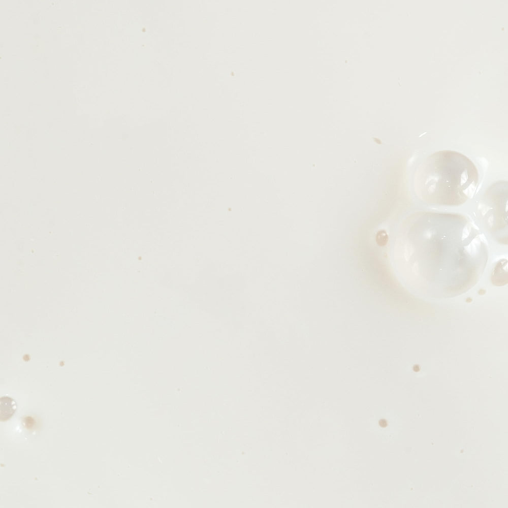 KORA Organics Silky Sun Drops spread on skin for a dewy finish.