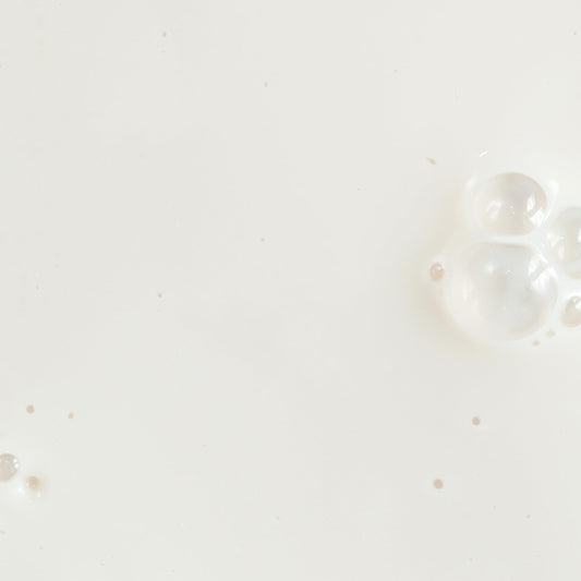 KORA Organics Silky Sun Drops spread on skin for a dewy finish.