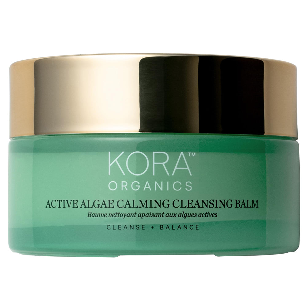 KORA Organics Active Algae Calming Cleansing Balm jar closeup showing creamy texture for makeup removal.