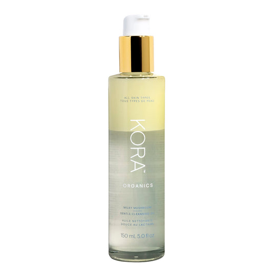 KORA Organics Milky Mushroom Oil Cleanser bottle pours for a gentle cleanse