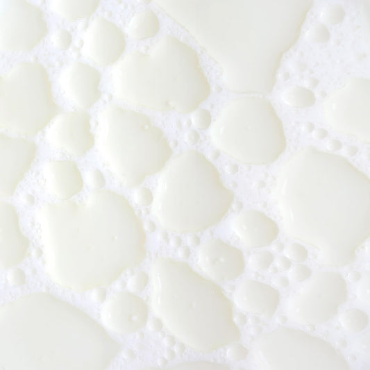 KORA Organics Milky Mushroom Oil Cleanser shake-to-milk action activates cleansing