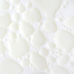 KORA Organics Milky Mushroom Oil Cleanser shake-to-milk action activates cleansing
