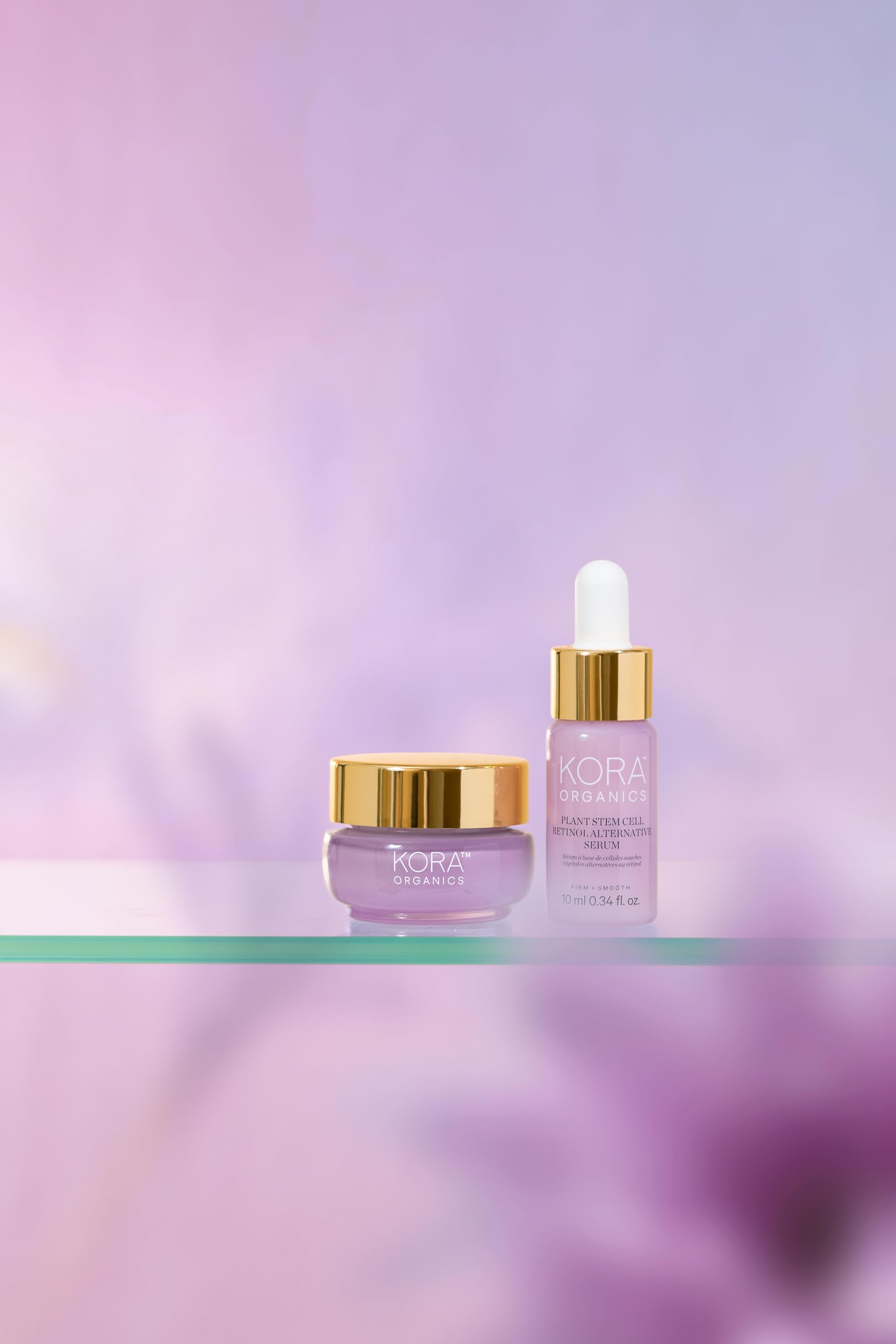 KORA Organics serum texture close-up shows milky finish and smooth feel.