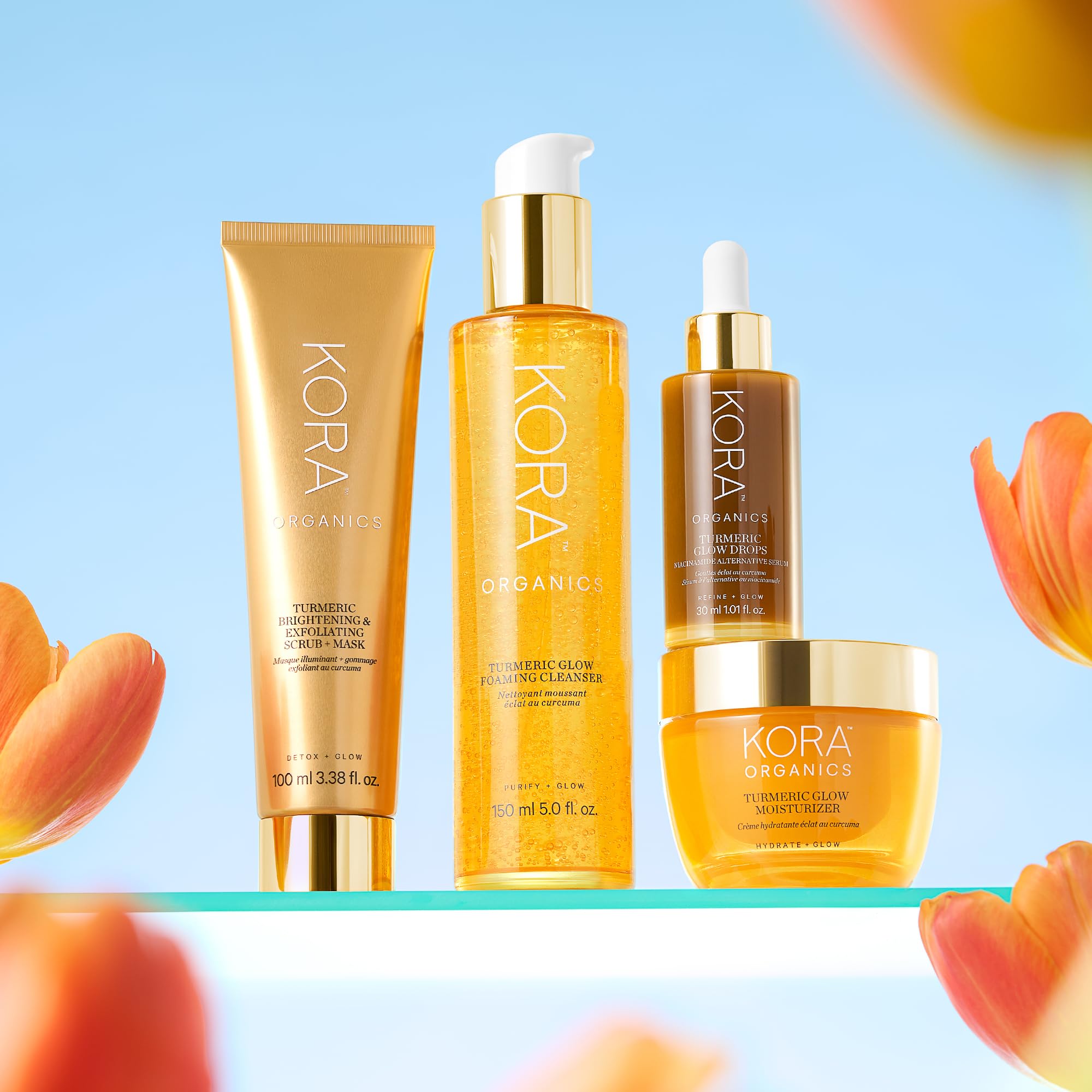 KORA Organics Turmeric Glow Drops citrine crystal evokes energizing ritual.
