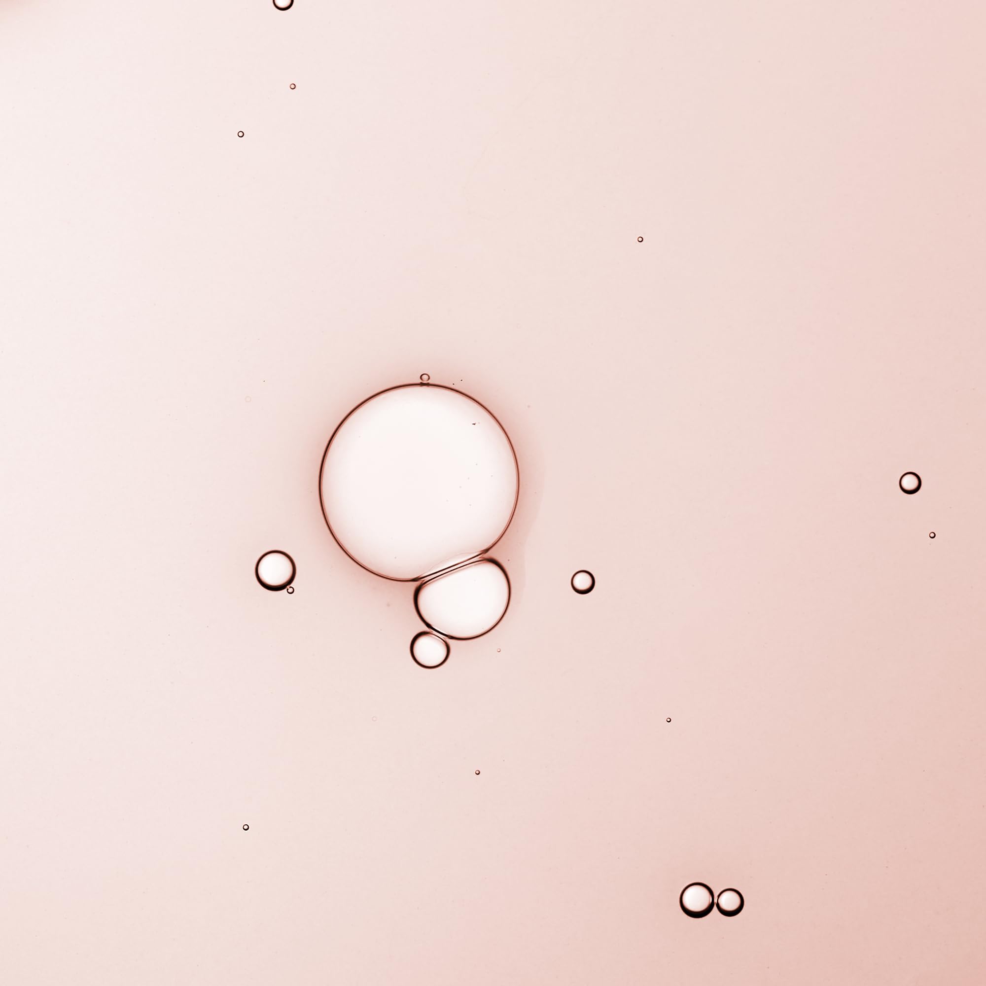 KORA Organics Turmeric Glow Drops dropper releasing serum for nourishment.