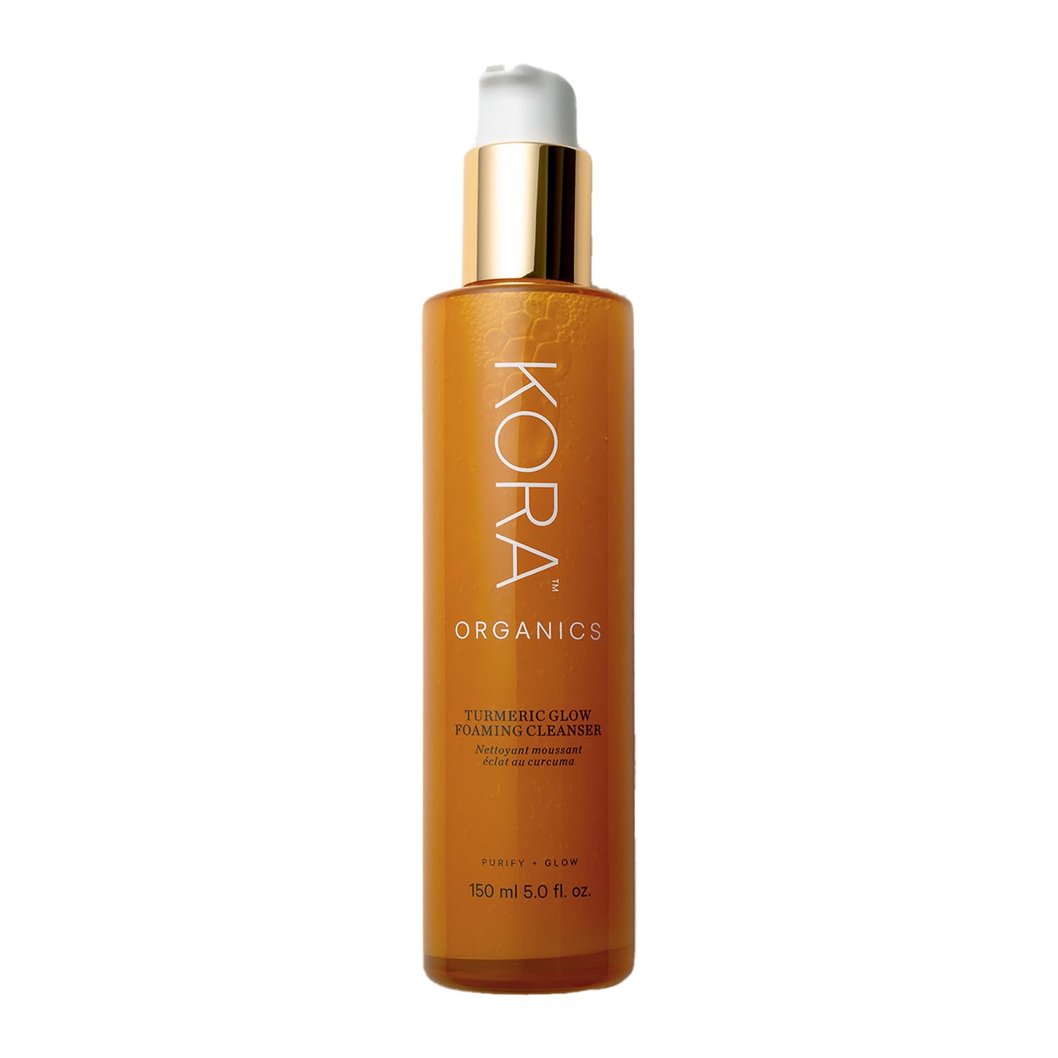 KORA Organics Turmeric Glow Foaming Cleanser bottle offers a refreshing cleanse.
