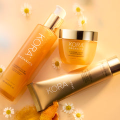 KORA Organics Turmeric Glow Moisturizer jar shown with refill pod for reuse.