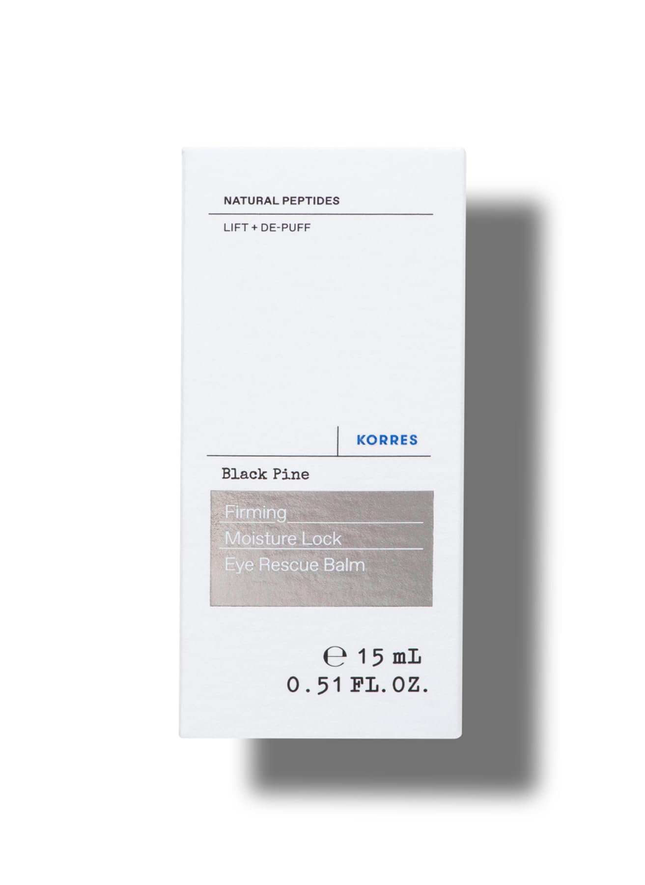 KORRES Black Pine Eye Rescue Balm applied under-eye for gentle hydration