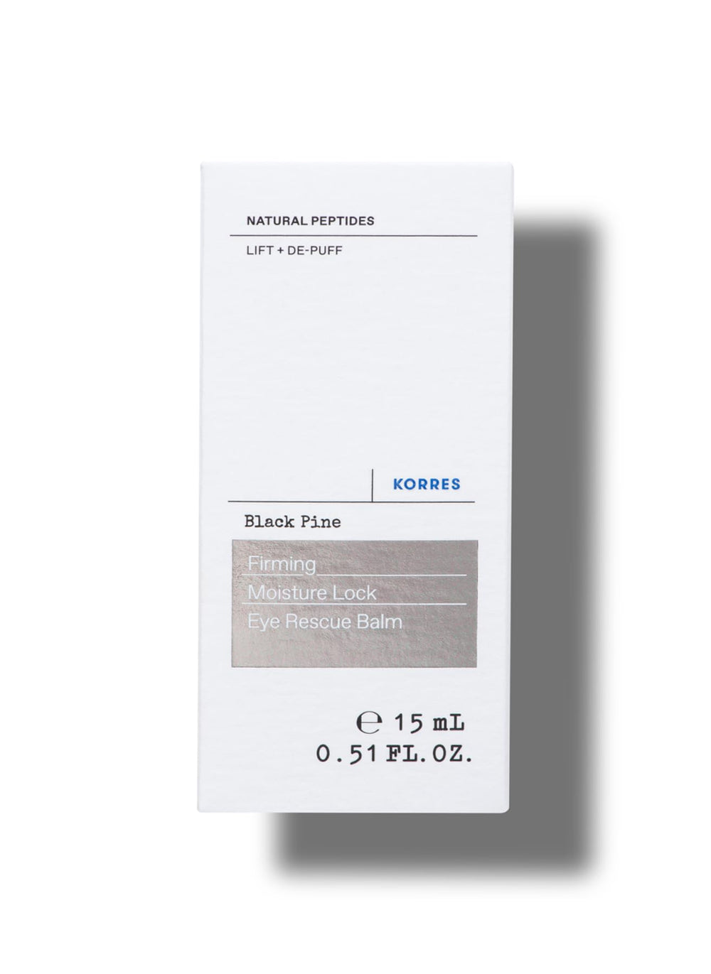 KORRES Black Pine Eye Rescue Balm applied under-eye for gentle hydration