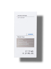 KORRES Black Pine Eye Rescue Balm applied under-eye for gentle hydration
