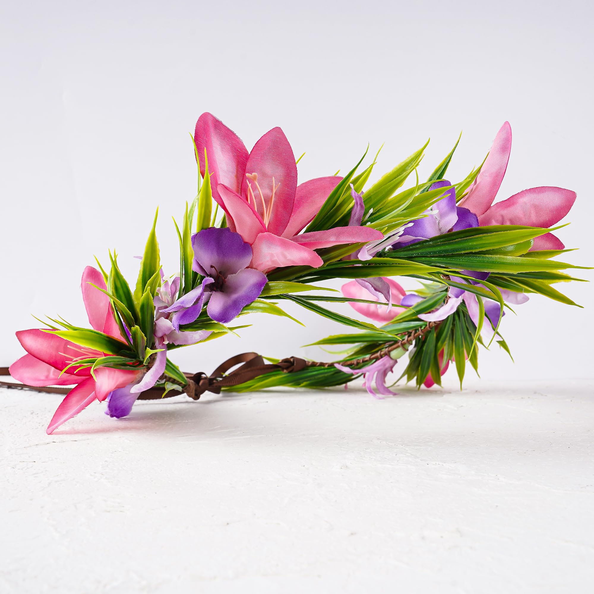 KorViSHOW tropical flower wreath enhances vibrant summer outfits.