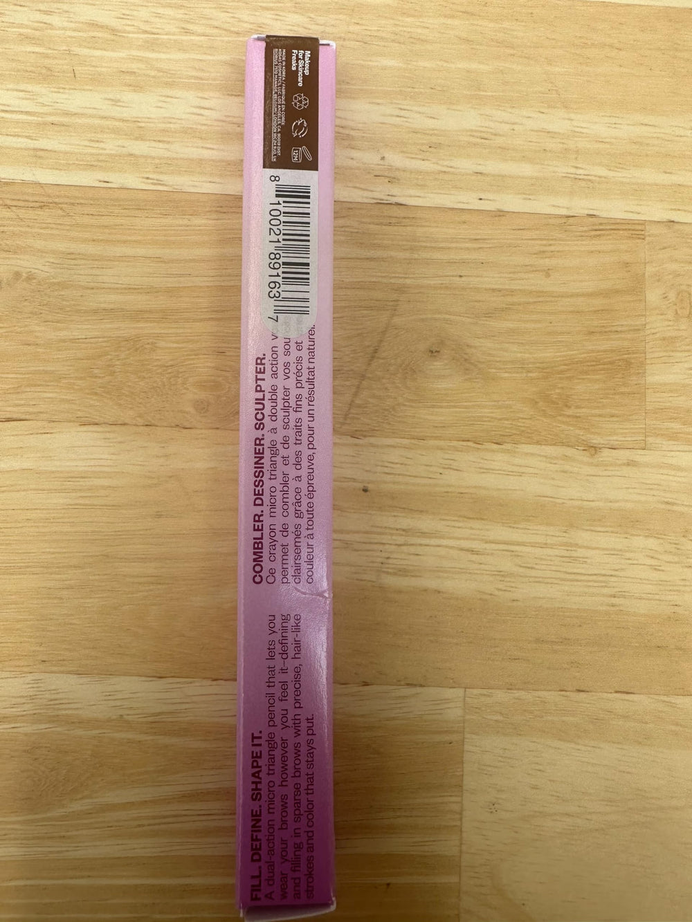 Kosas Brow Pop built-in spoolie blends brow color evenly