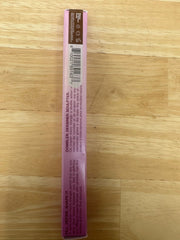 Kosas Brow Pop built-in spoolie blends brow color evenly