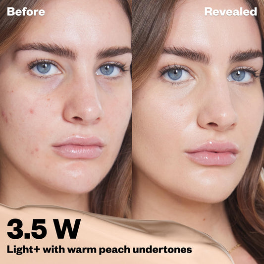 Close-up of applicator tip blending concealer under-eye