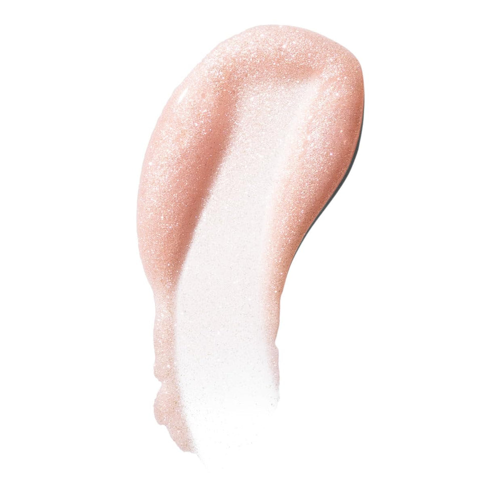 Close-up lips wearing Kosas Wet Lip Oil Gloss with visible color payoff.