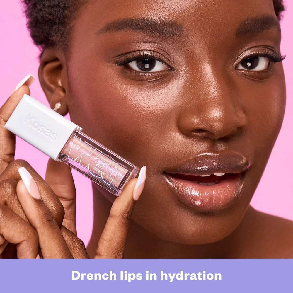 Layered lip look using Wet Lip Oil Gloss for longer wear and shine.