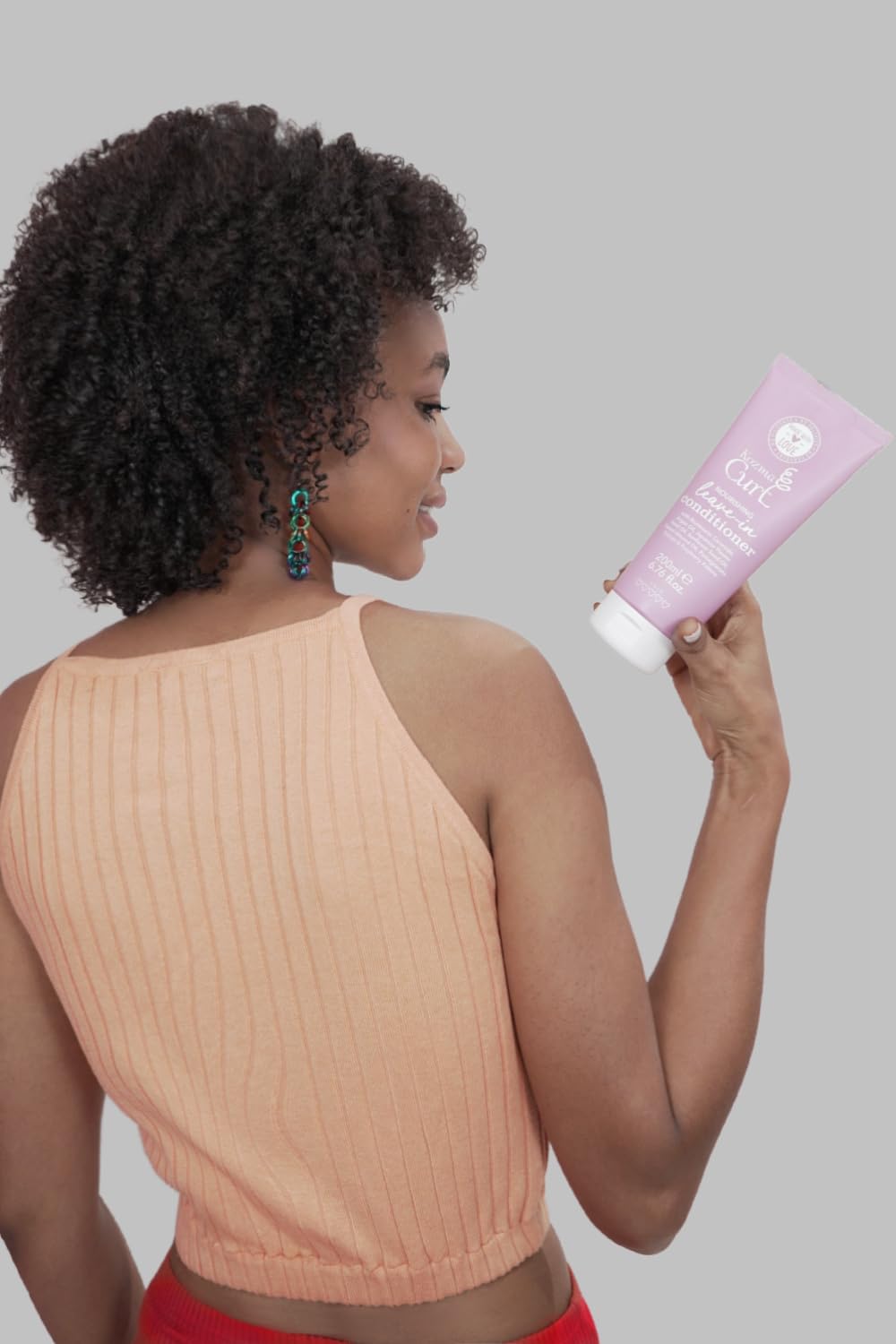 Kozma Curl jasmine-scented finish emphasizes fragrance while caring for curls.