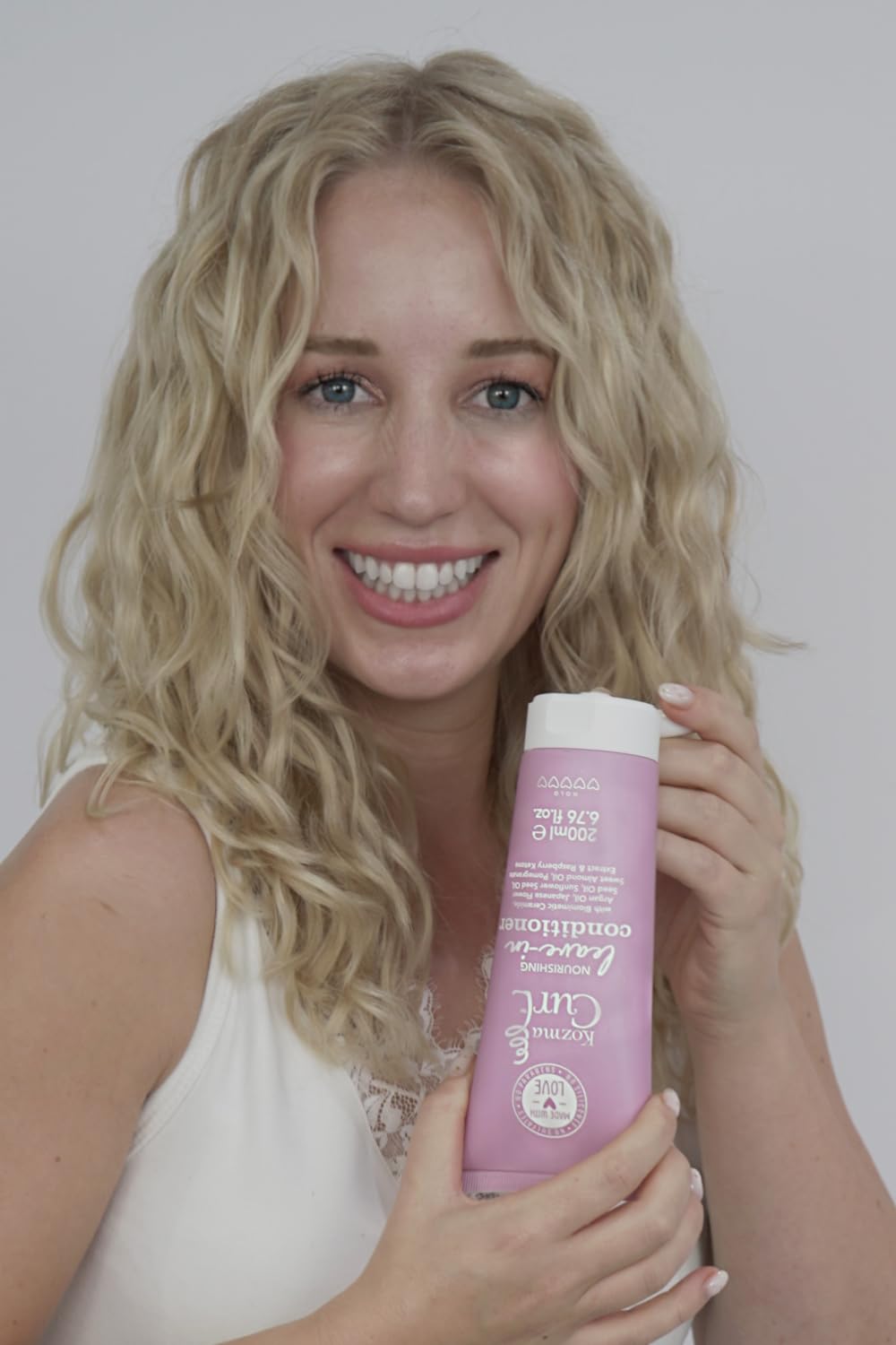 Kozma Curl leave-in detangle-before-styling text reinforces prep before creams or gels.
