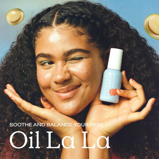 KraveBeauty Oil La La Serum dropper releasing a light, watery texture