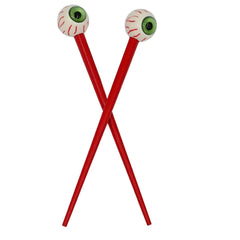 Kreepsville 666 creepy green eye ball hair sticks close-up, a bold gothic accessory for Halloween looks