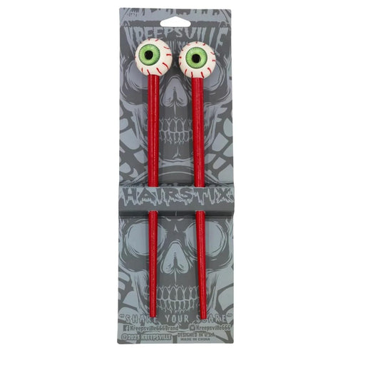 Kreepsville 666 creepy green eye ball hair sticks worn in hair for dramatic spooky style