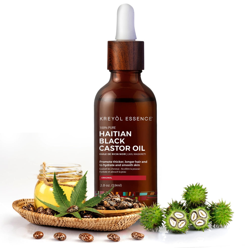KREYÒL ESSENCE bottle highlights rosemary peppermint scent for scalp comfort.