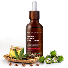 KREYÒL ESSENCE bottle highlights rosemary peppermint scent for scalp comfort.