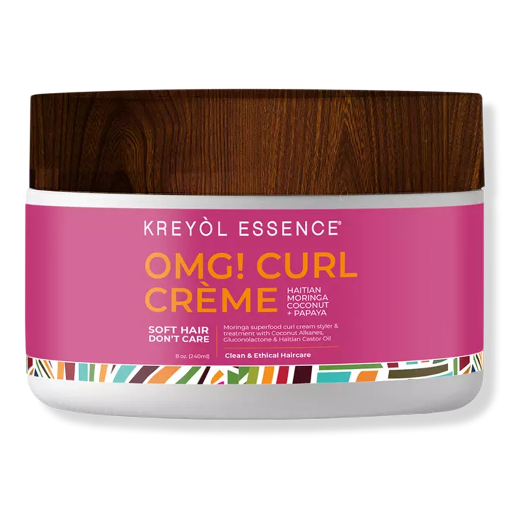 Kreyol Essence Moringa Styling OMG Curl Creme bottle defining curls with shine.