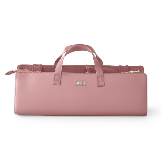 KUSSHI bag with elastic pockets keeps brushes secure on the go