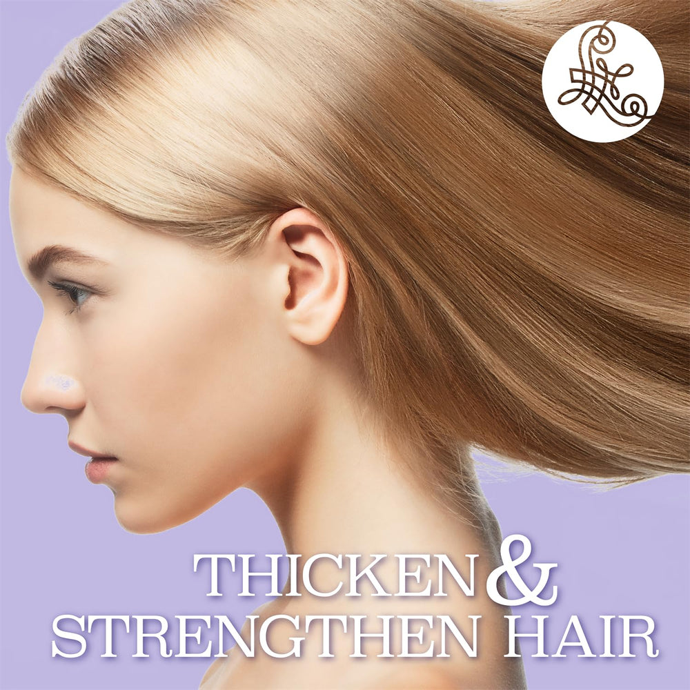 Luseta Biotin B-Complex Hair Oil applied to dry hair.