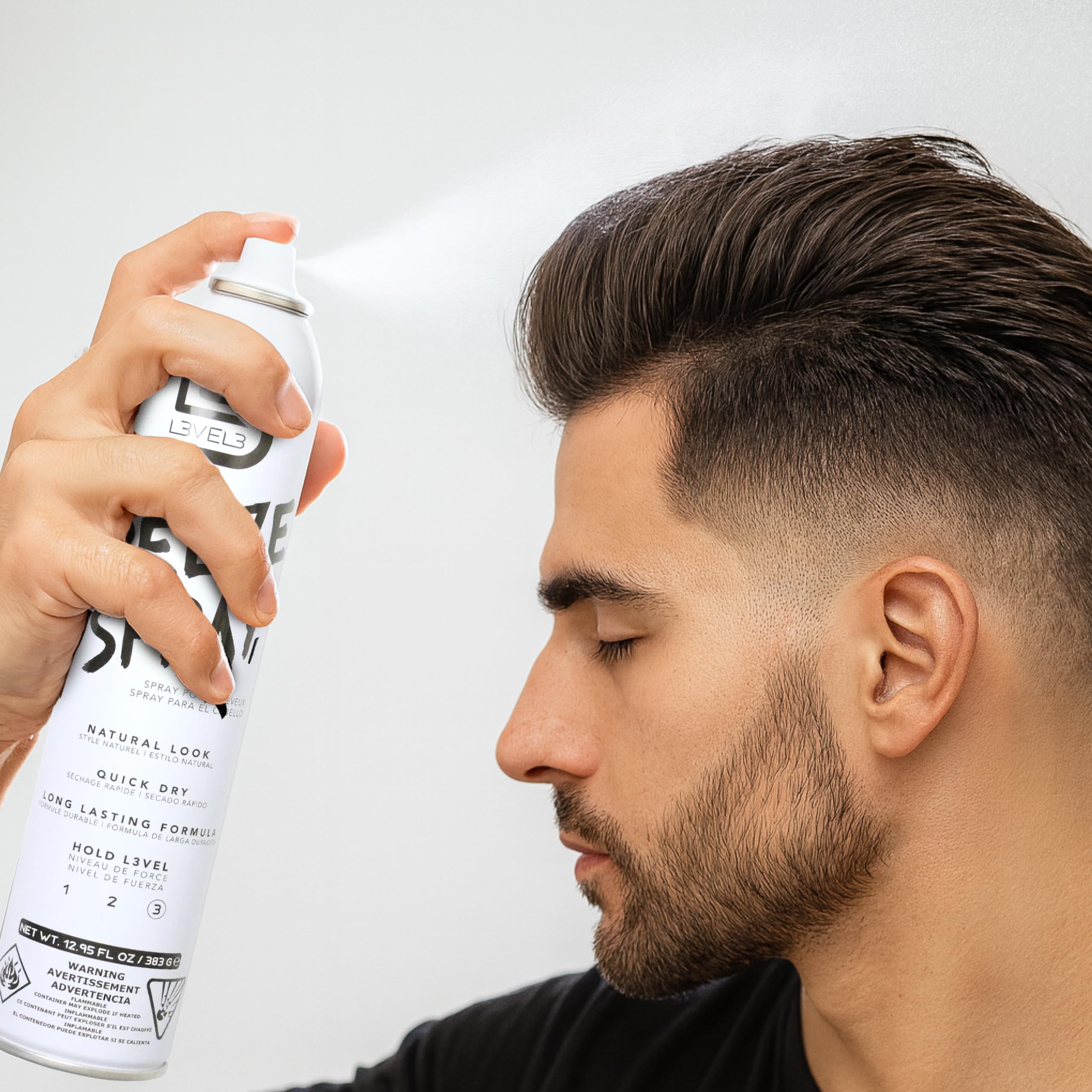L3 Level 3 Hair Spray mist being applied for even coverage