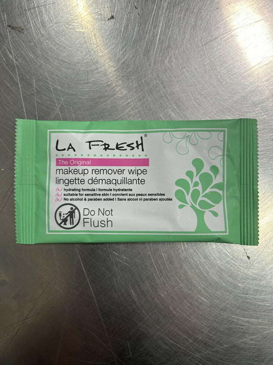 LA Fresh makeup remover wipes travel case in purse ready for mess-free cleansing.