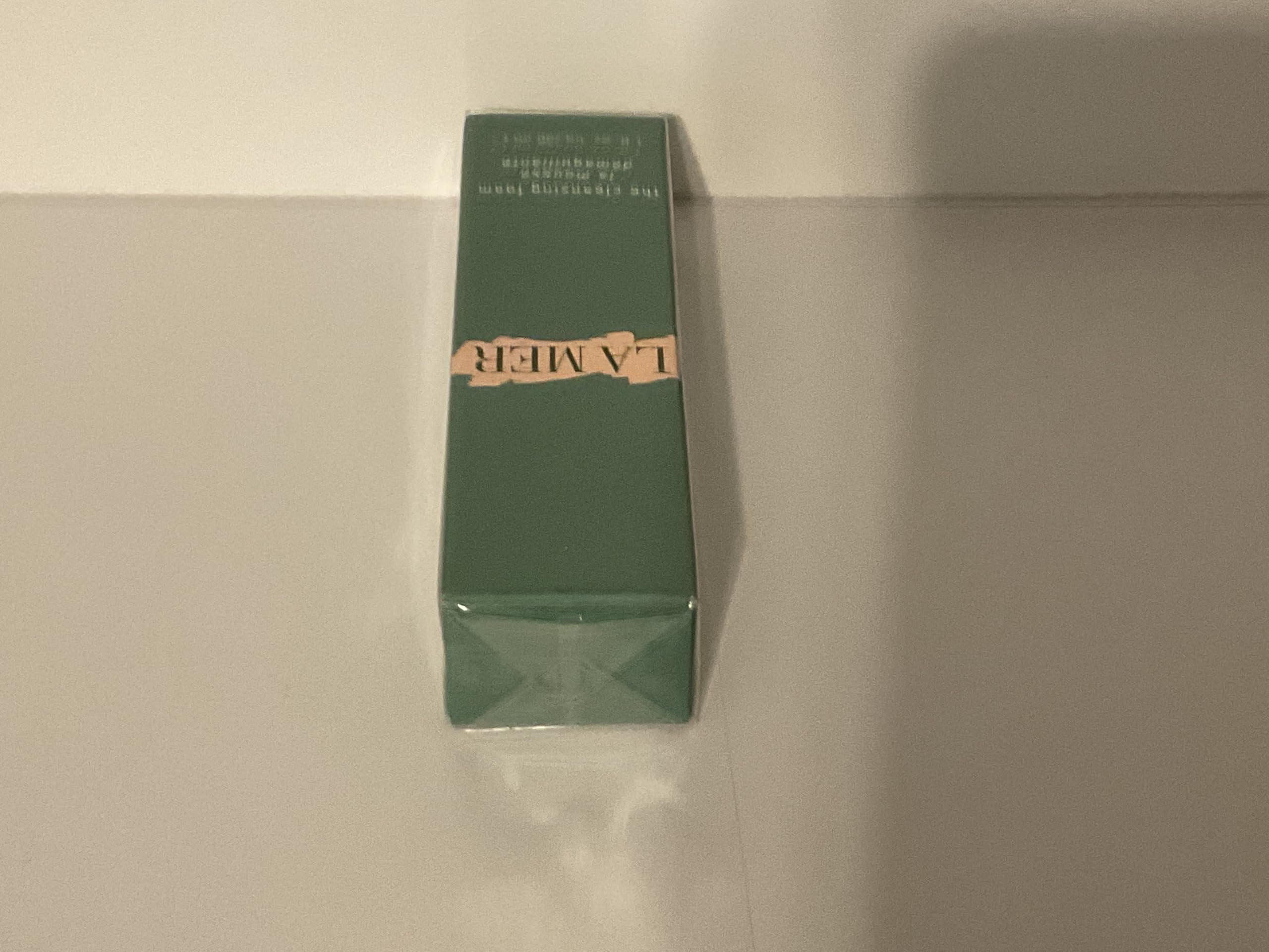 La Mer Cleansing Foam application massage image showing airy foam texture.