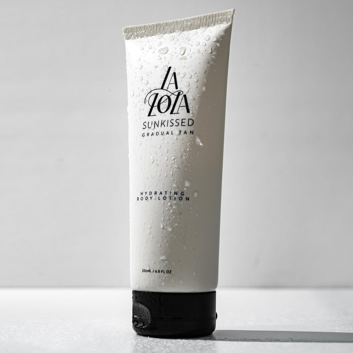 LALOLA Sunkissed bottle glow demonstrates a hydrating self-tanner for radiant skin