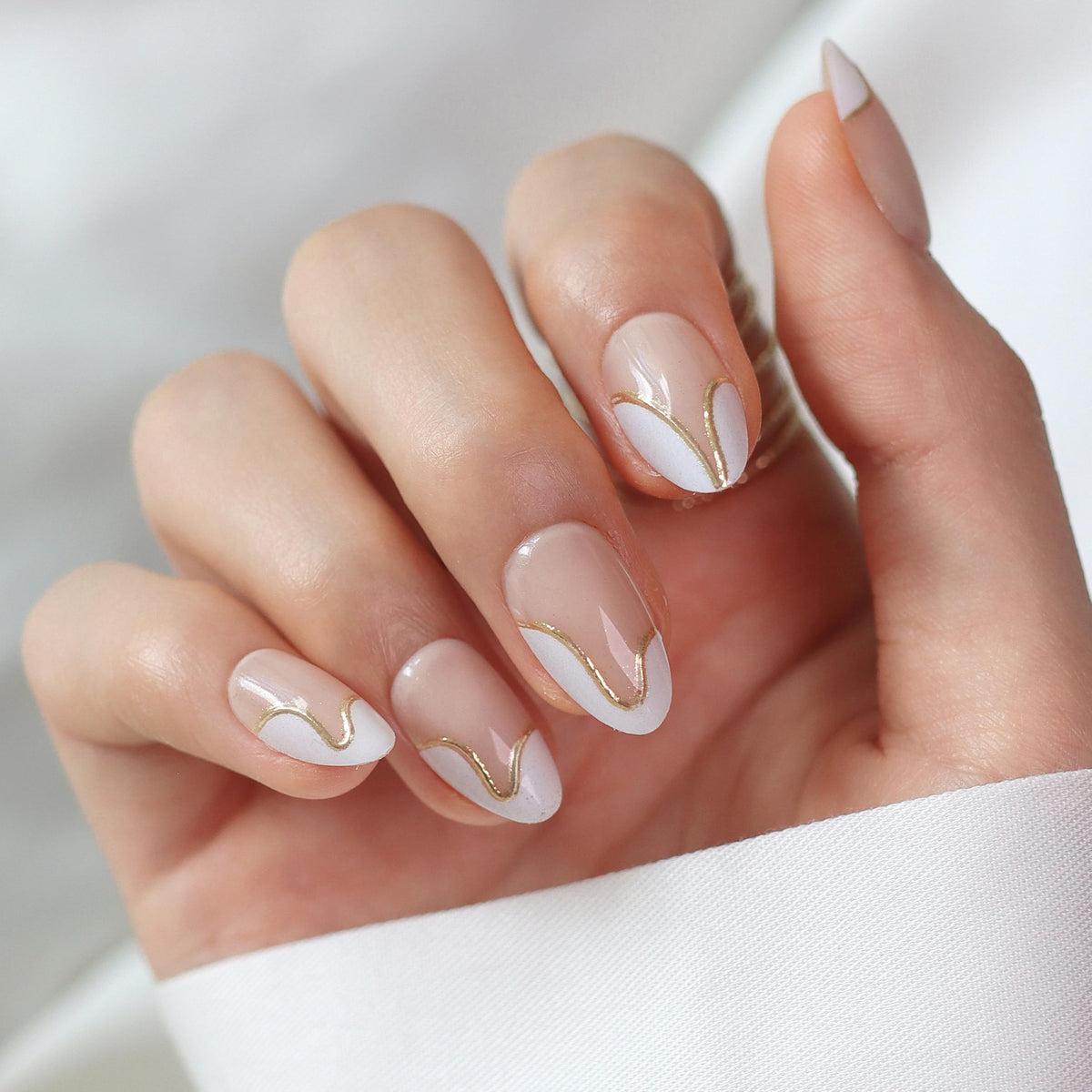 LAMIMOSA Swan Lake nails front view with almond shape and glossy finish.